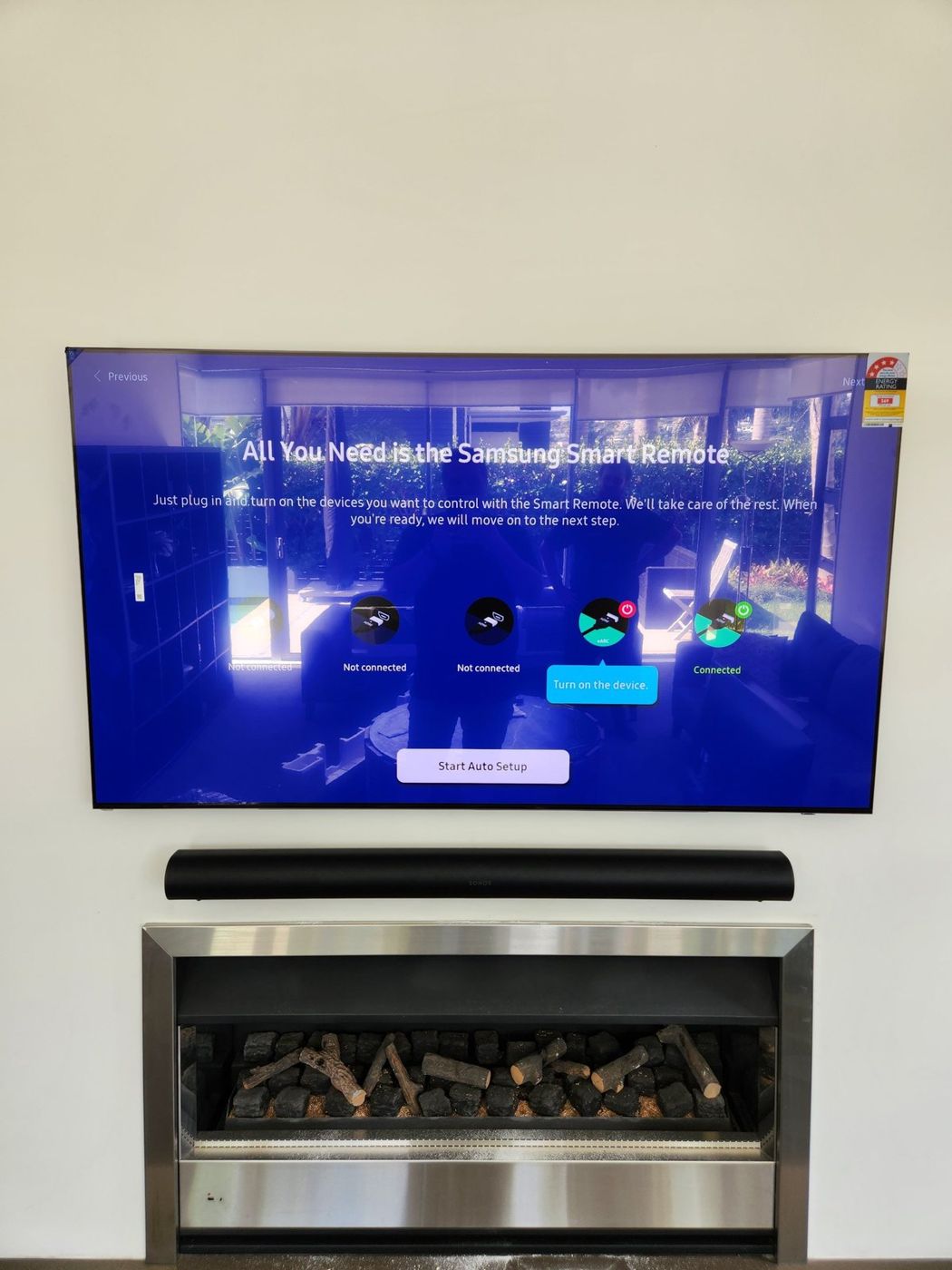 TV, Sonos soundbar and fireplace