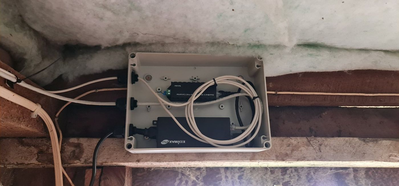 Weatherproof PoE enclosure powering a DoorBird intercom
