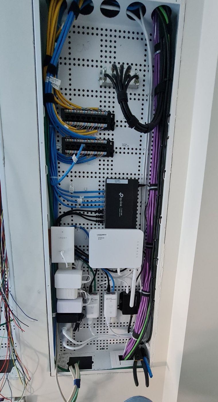 Comms cabinet with patch panels, switch and Wi-Fi access point power